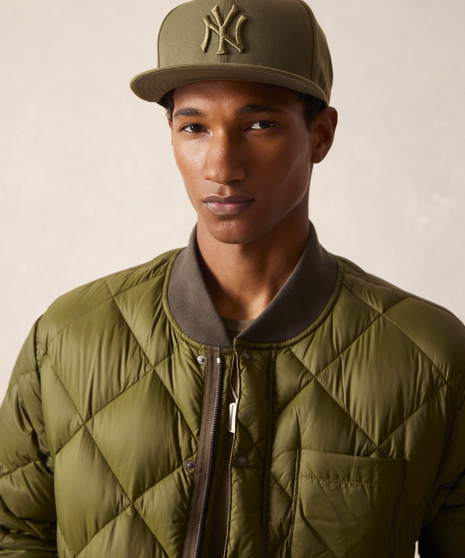Italian Quilted Down Snap Bomber in Olive - Image 8